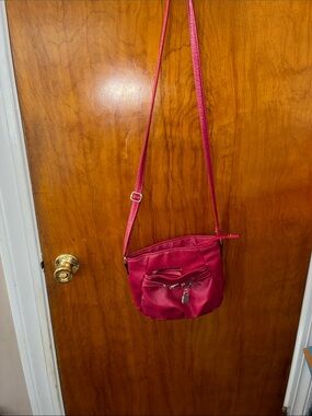 Rosetti Hot Pink Leather Crossbody Bag with Front Zip Pocket